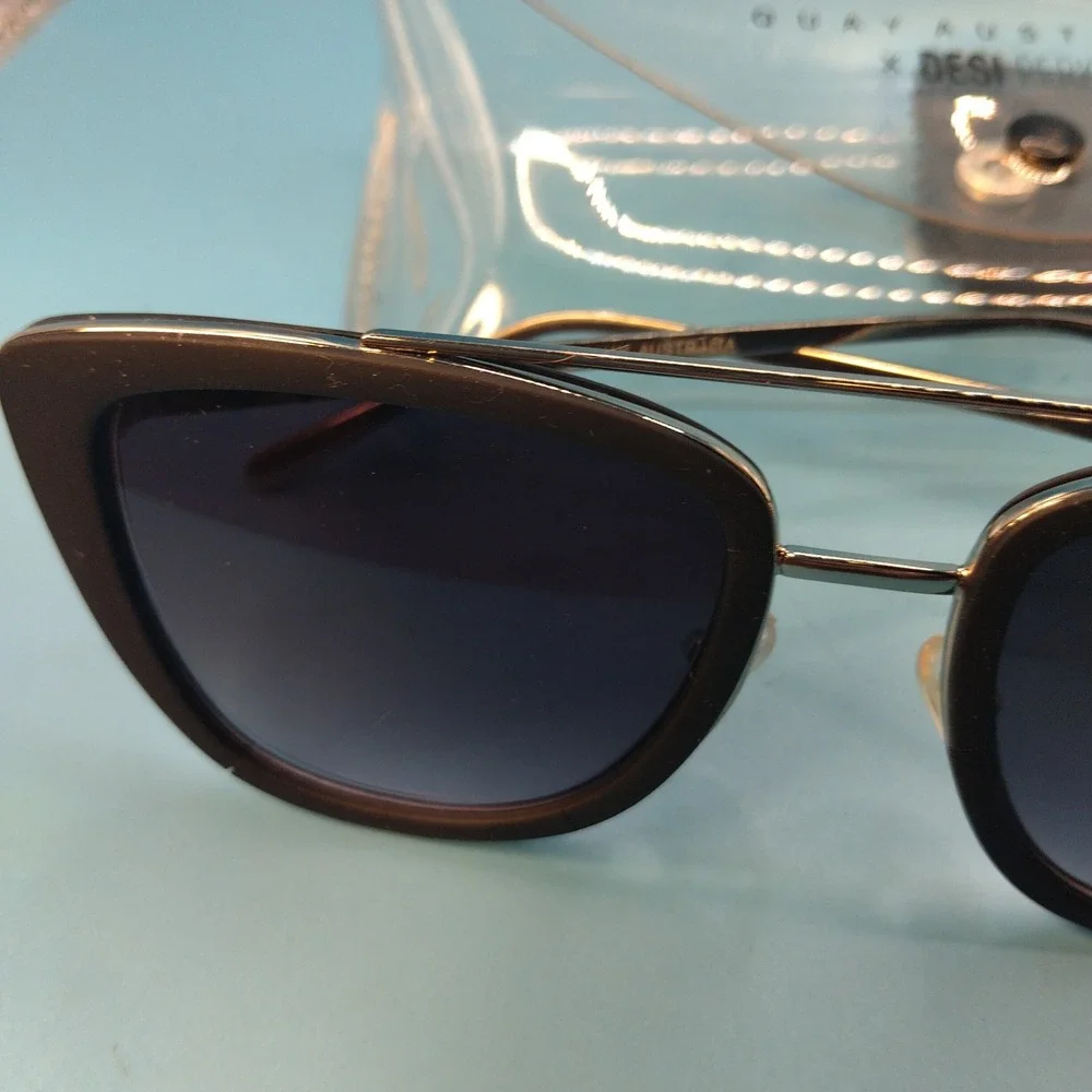 Quay Australia x Desi Perkins French Kiss Sunglasses Black Gold Cat Eye Flat Les